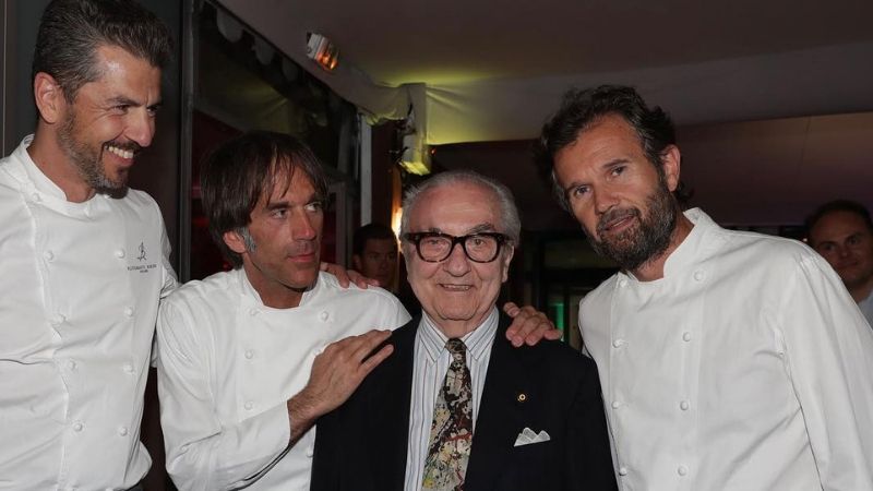 Fotografia di Marchesi con Cracco e altri chef